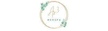 AS3 Medical Spa logo featuring a cursive letter "A" representing luxury, in shades of bronze gold. The text "AS3" is encapsulated in a circle with greenish plants on a vine, while "MED SPA" in all capitals is written in smaller font underneath. The logo conveys a sense of calmness, relaxation, and professionalism | AS3 Med Spa