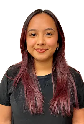 Brenda Camargo, front office staff at AS3 Medical Spa, smiling in a black top.