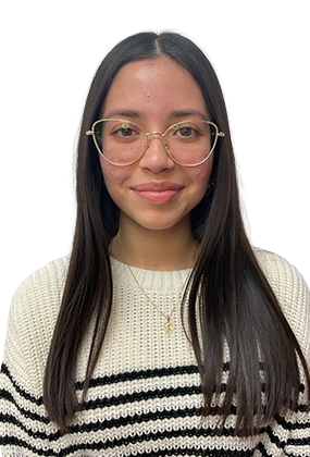 Daniela Flores, front office staff at AS3 Medical Spa, wearing glasses and a striped sweater.