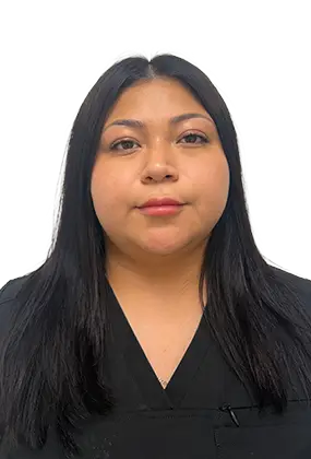 Jedy Gomez, front desk receptionist at AS3 Medical Spa, wearing black medical scrubs.
