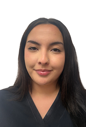 Kaylie Cabrera, front desk receptionist at AS3 Medical Spa, smiling while wearing black medical scrubs.